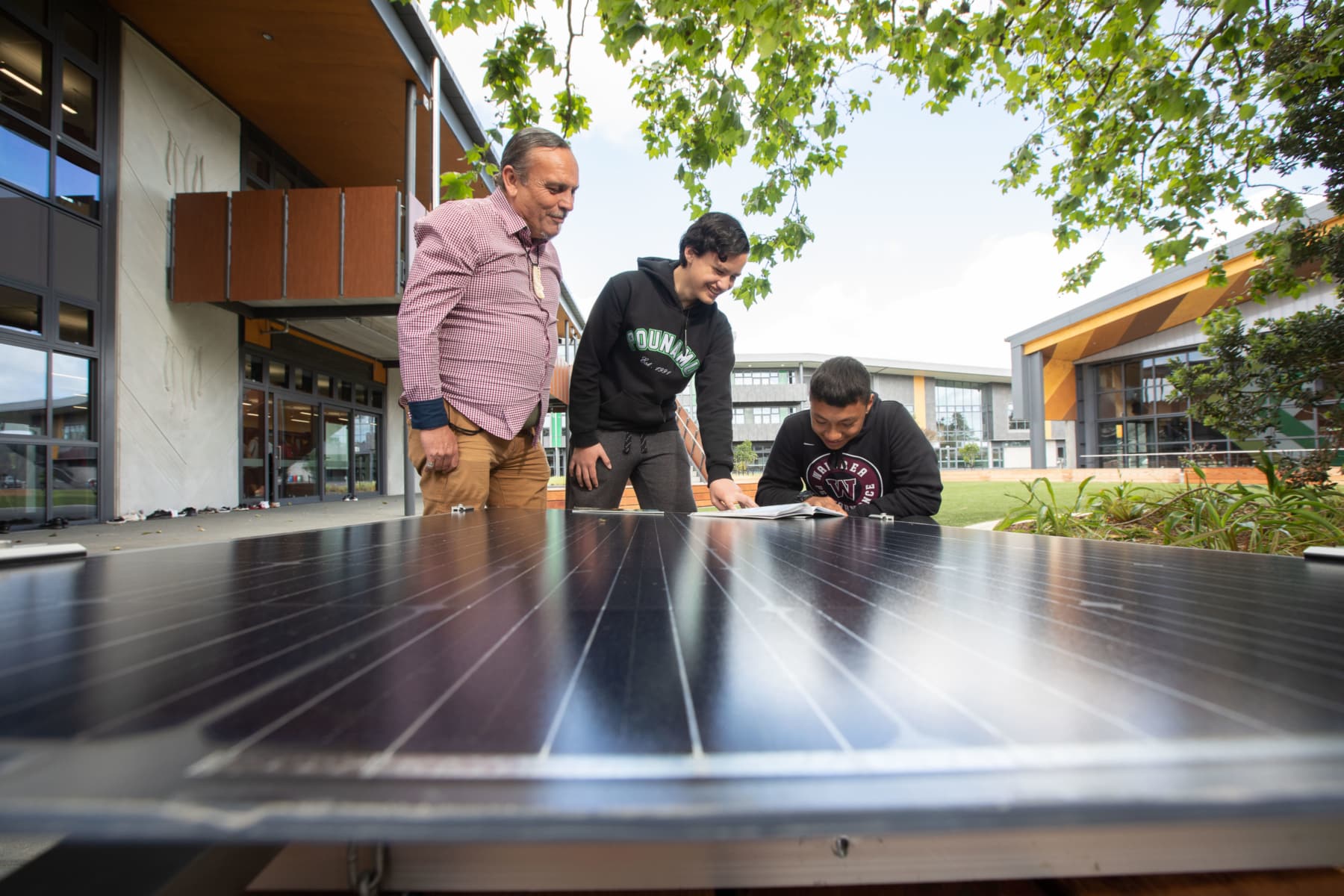 Students with solar panels